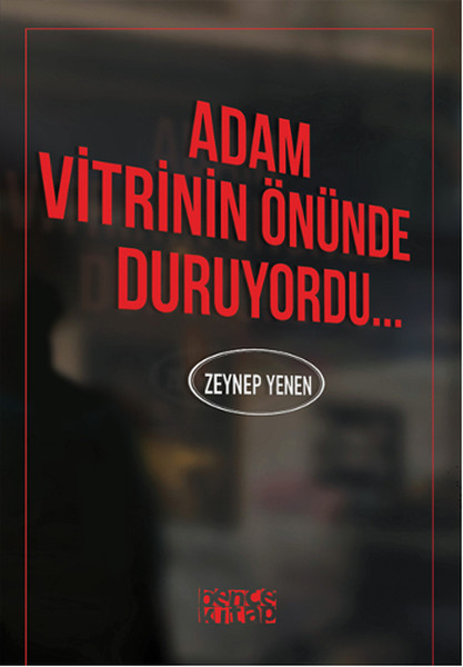 Adam Vitrinin Önünde Duruyordu...